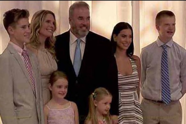 Mike McCarthy with his spouse and five children; three daughters and two sons